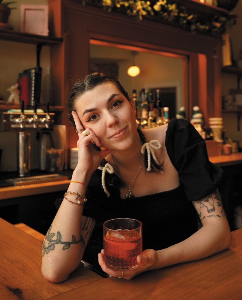 photo of Karen at the bar with drink