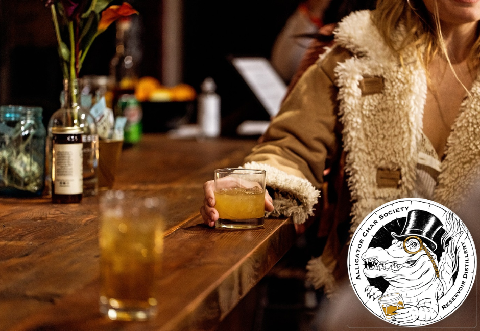 Bar and cocktails with a logo of the Alligator Char Society at Reservoir Distillery.