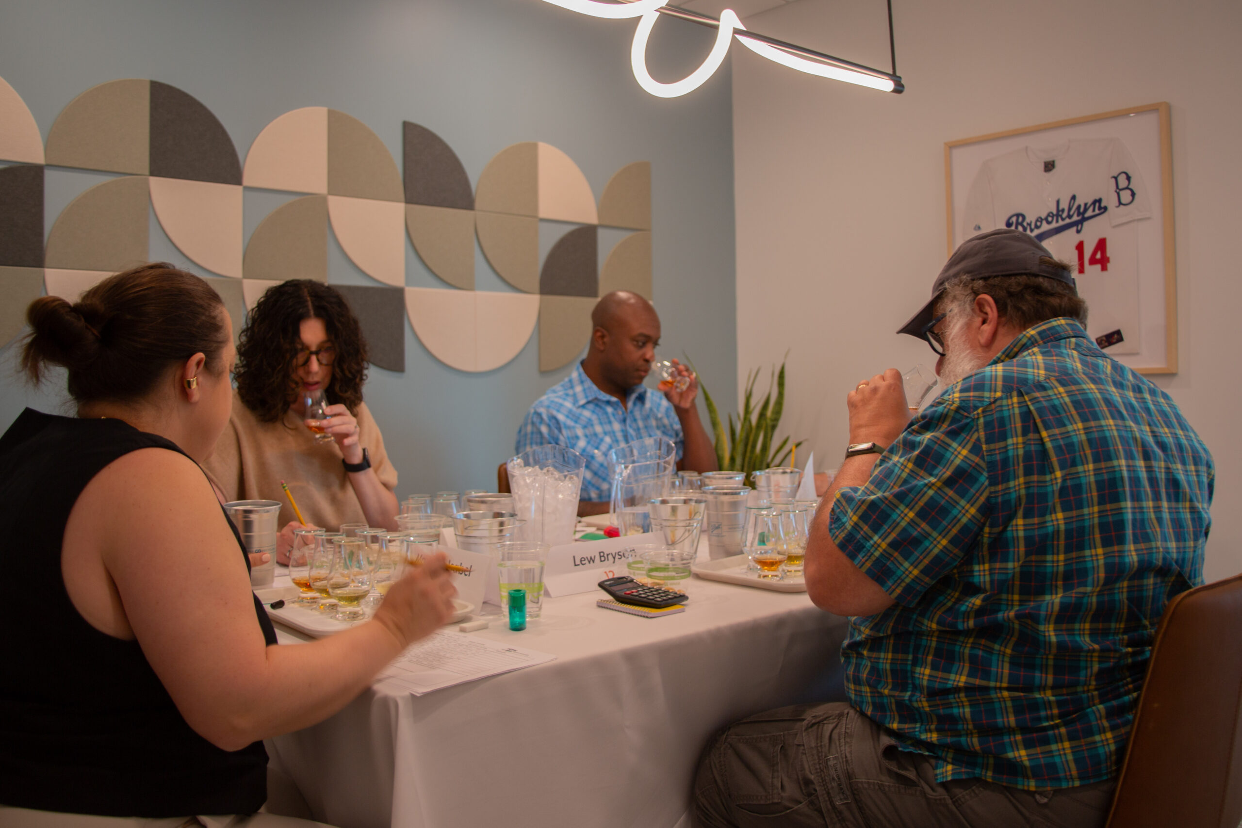 Judges sample Virginia spirits at the First Landing Cup