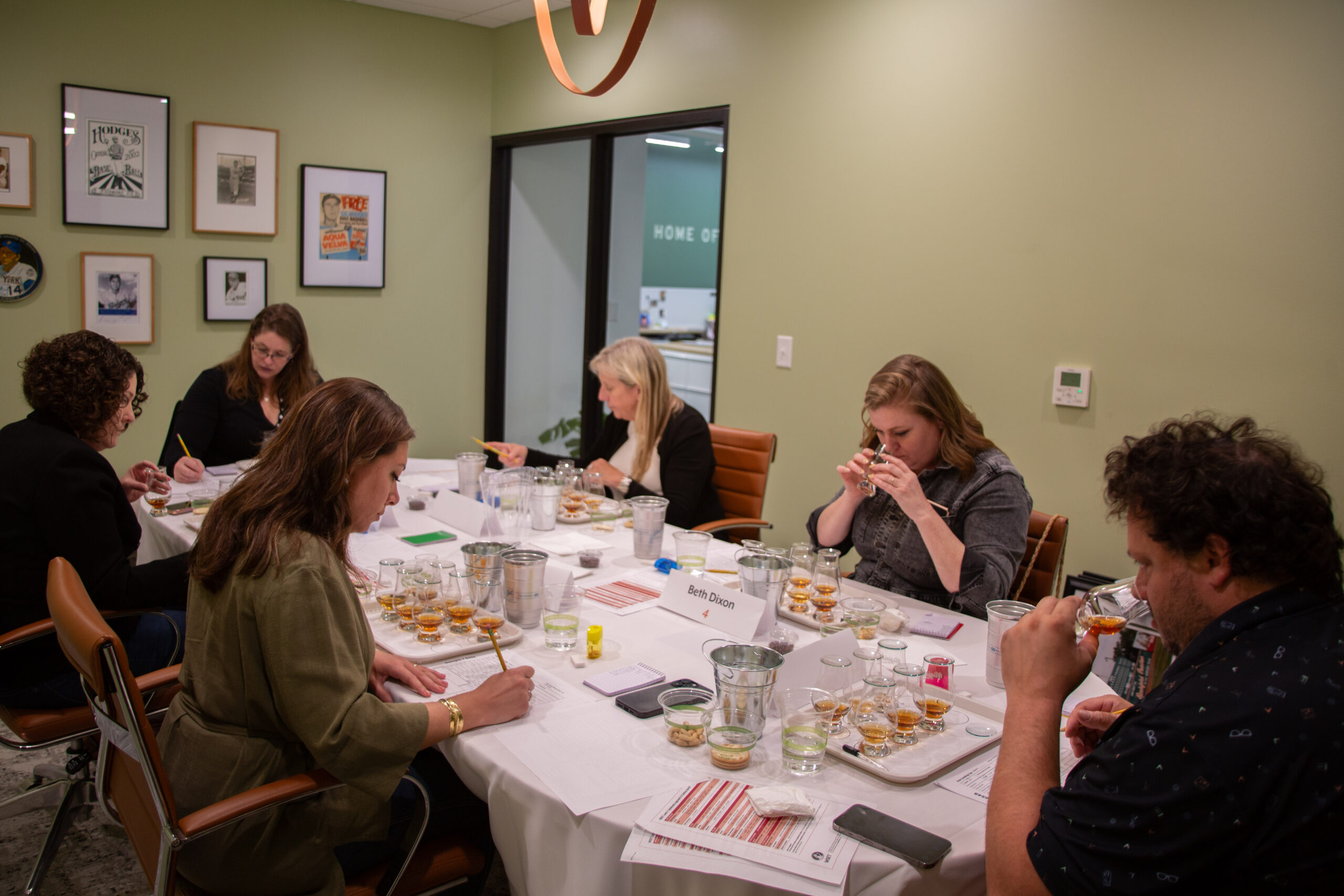 Judges sample Virginia spirits at the First Landing Cup