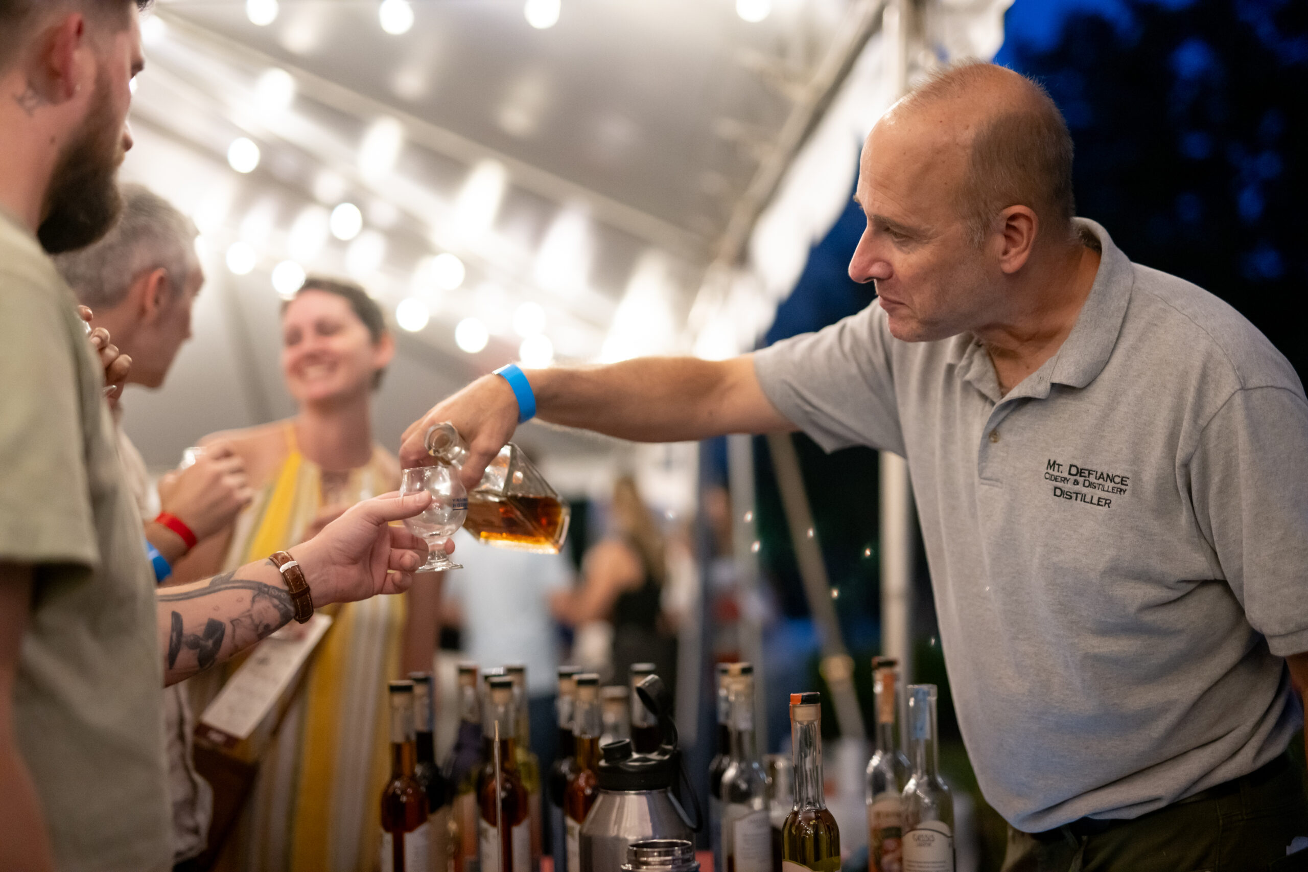 distillery pouring spirits tastings at Virginia Distilled