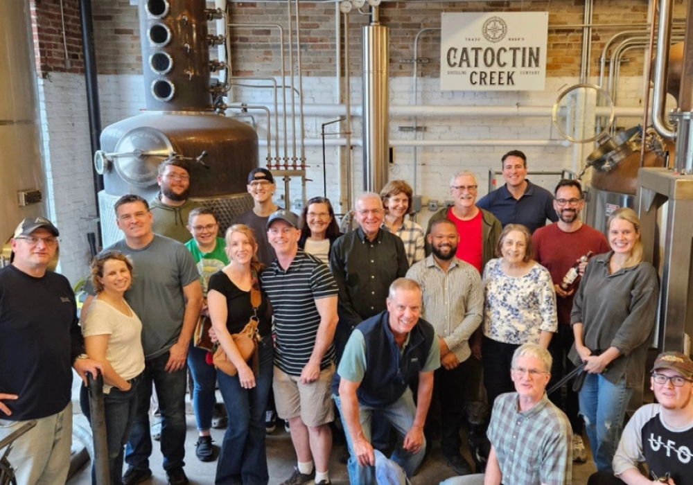 Group of people in a distillery