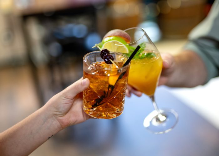 Cheers with 2 cocktails